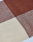 Close-up of the brown and cream colors on this handwoven scarf