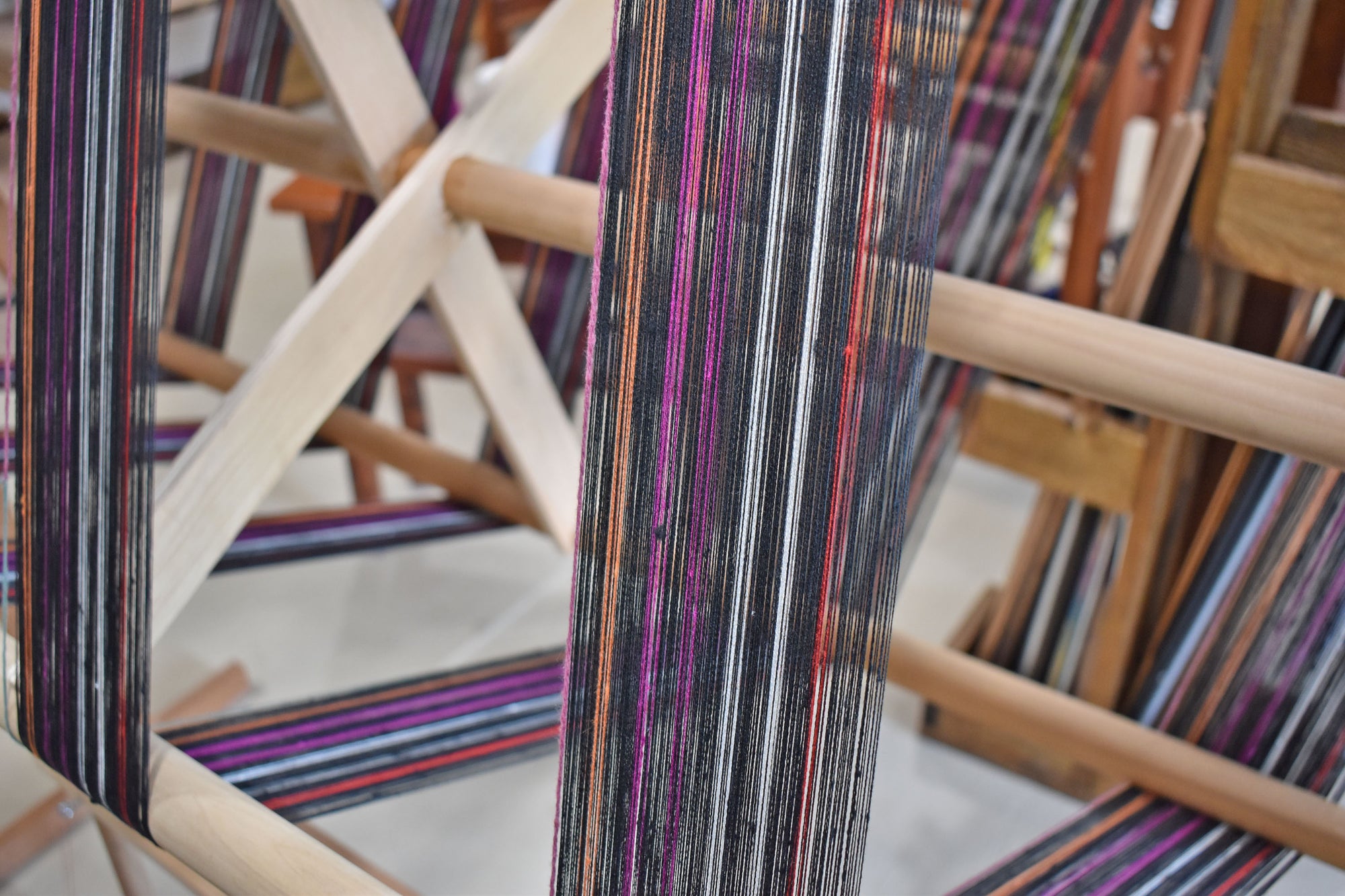 Making the warp (vertical yarns) for the black sunset scarf