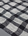 Black Merino Wool with White Up-cycled Viscose Handwoven Plaid Puckered Scarf