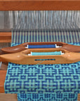 Blue + green handwoven textured scarf on the loom