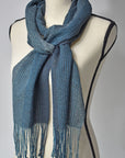 Blue + green handwoven scarf with up-cycled exclusive yarns on a mannequin