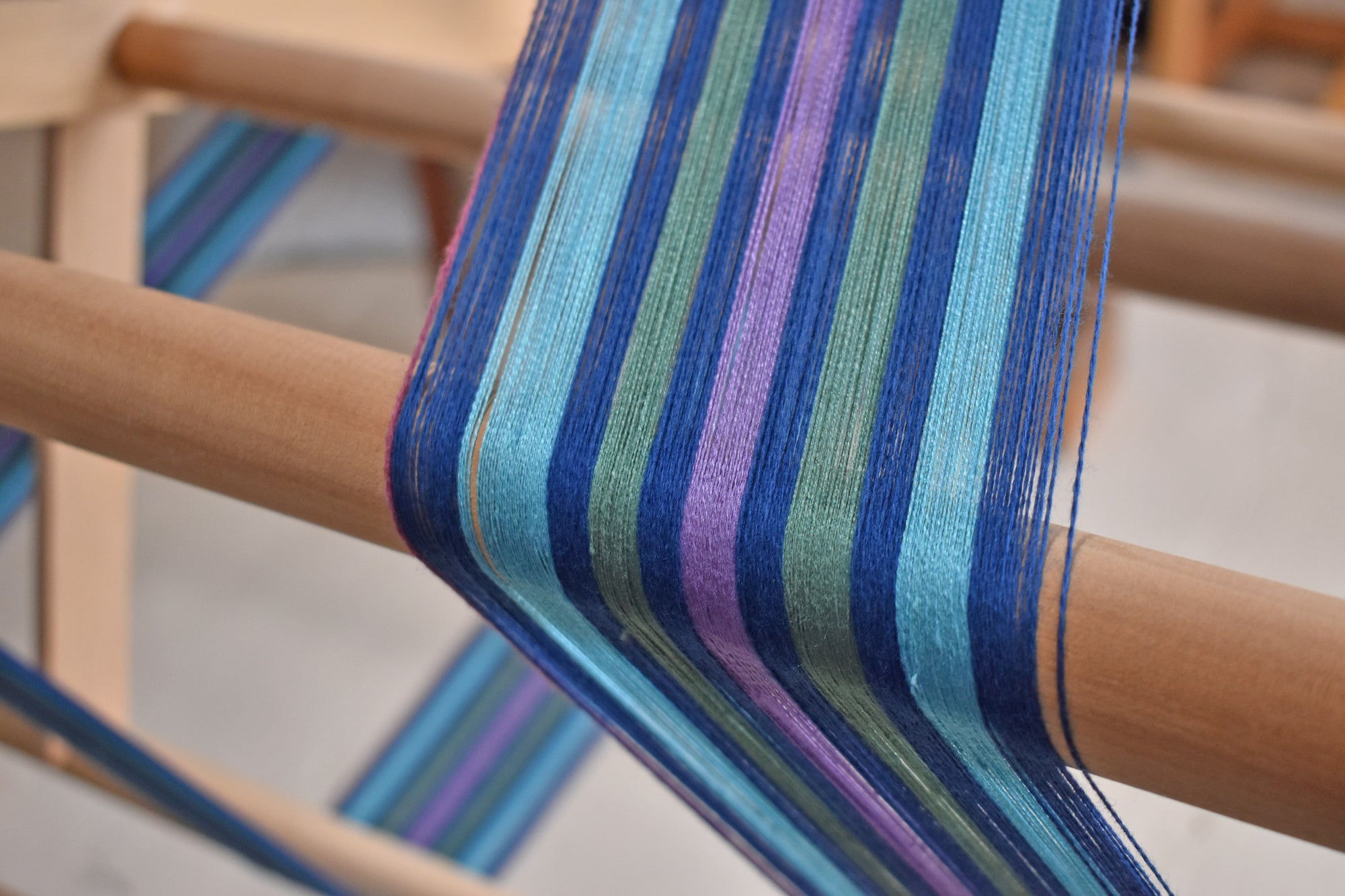 Close- up of the warp on the warping board. These yarns then get put on the loom.