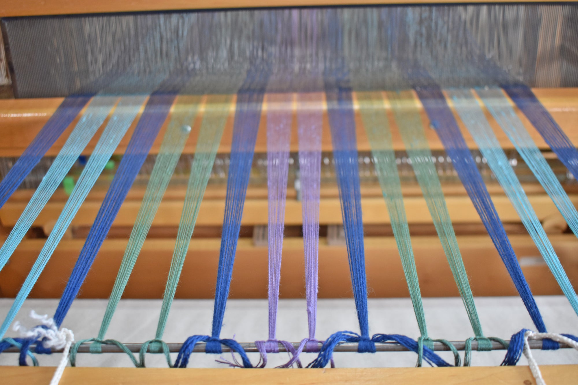 Yarns on the loom and getting ready to weave the handwoven scarf