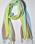 Bold colors hand-painted scarf styled on a white table