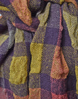 Close-up of the scarf styled on a mannequin