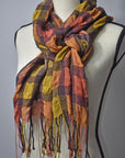 Brown wool with peach + gold up-cycled viscose yarn handwoven puckered scarf on a mannequin