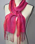 Fuchsia handwoven scarf woven with up-cycled yarns styled on a mannequin