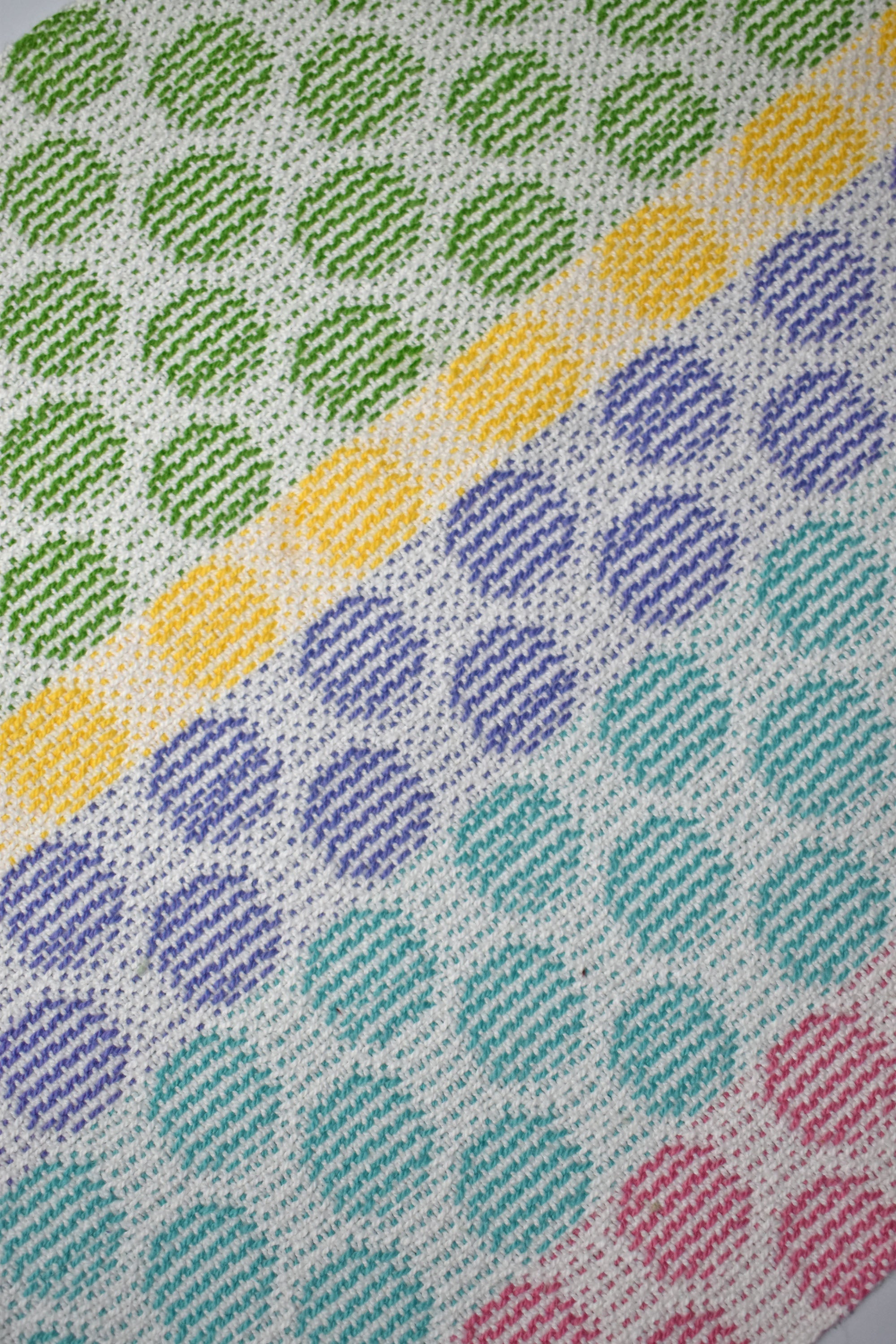 Close-up of the polka dot handwoven organic cotton placemat