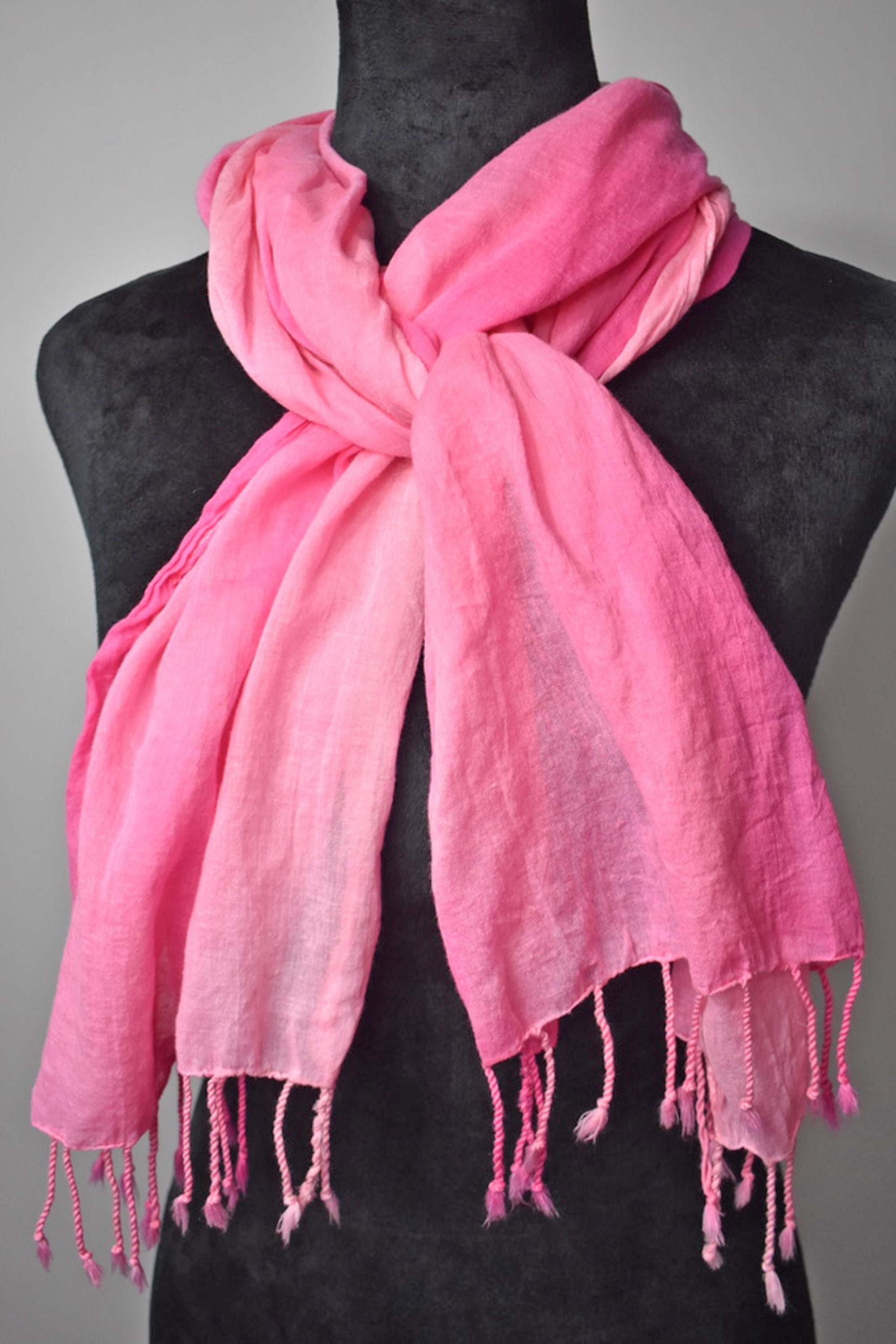 Pretty in pink cotton hand-painted scarf on a mannequin