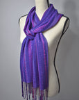 Purple handwoven scarf on a mannequin