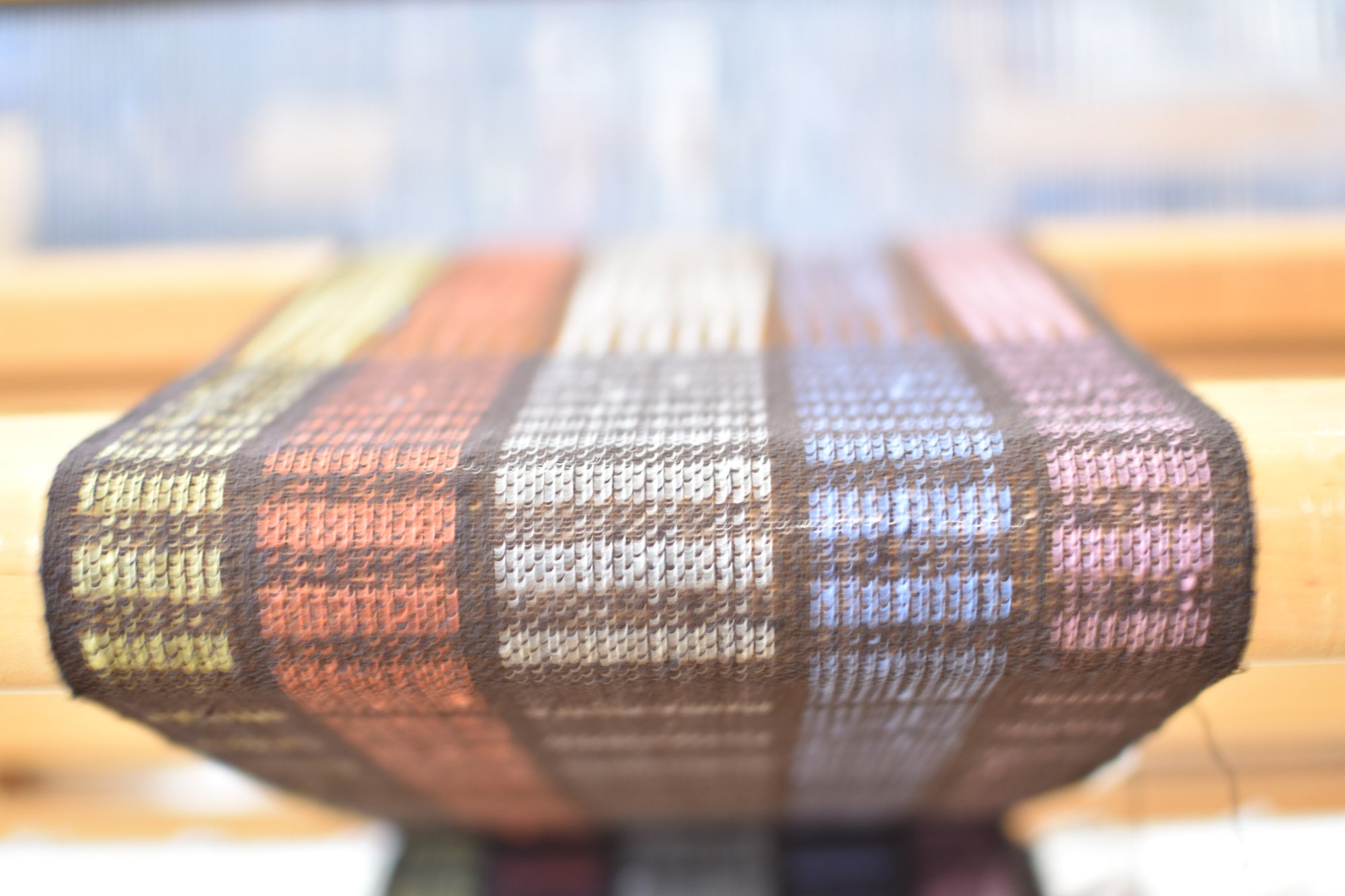 Close-up of the scarf on the handweaving loom